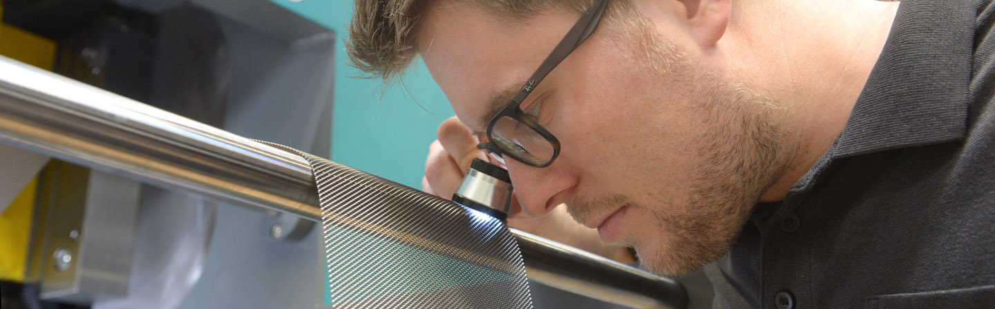 Testing expanded metal using a magnifying glass